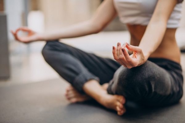 young-woman-practicing-yoga-home (1)